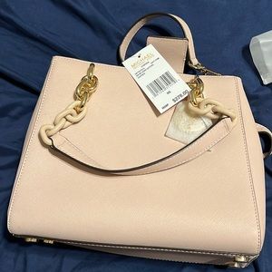 Light pink brand new purse Michael lots never worn